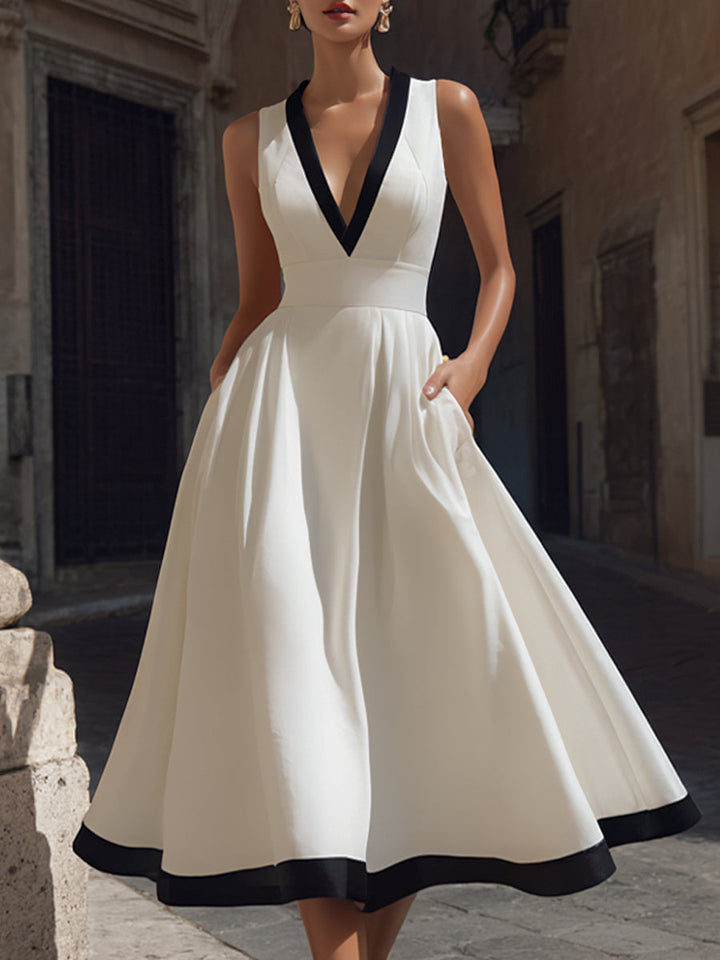 Olivia Bennet | Elegant V-Neck A-Line Midi Dress With Contrast Trim And Pockets