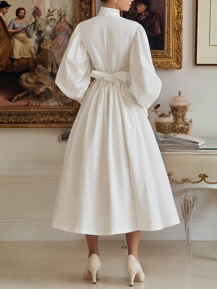 Olivia Bennet | A-Line High Waisted Pleated Pockets Solid Color Tied Waist High Neck Midi Dresses