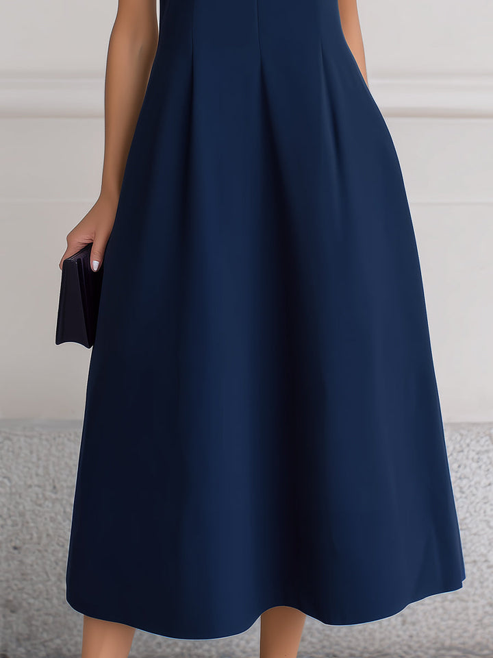 Olivia Bennet | Sleeveless Deep V-Neck Inverted Pleat A-Line Midi Dress