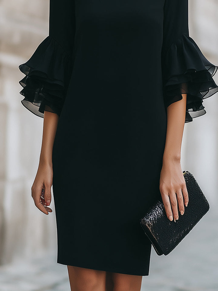 Olivia Bennet | Black Dress With Ruffled Sheer Sleeves