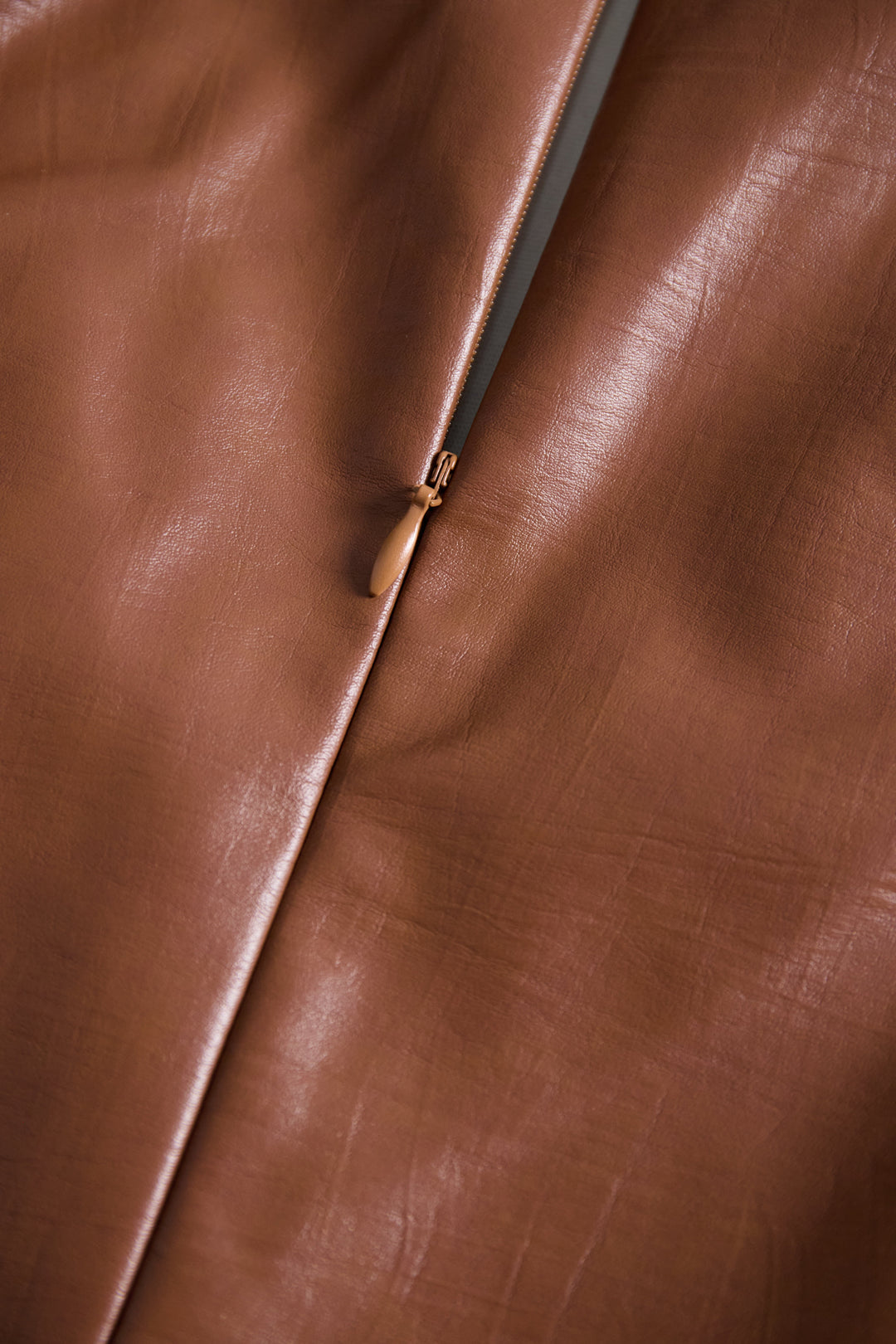 Olivia Bennet | Caramel Sleeveless Belted Faux Leather Midi Dress